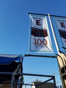 Banners mounted on poles read "the Big E 100 Years"