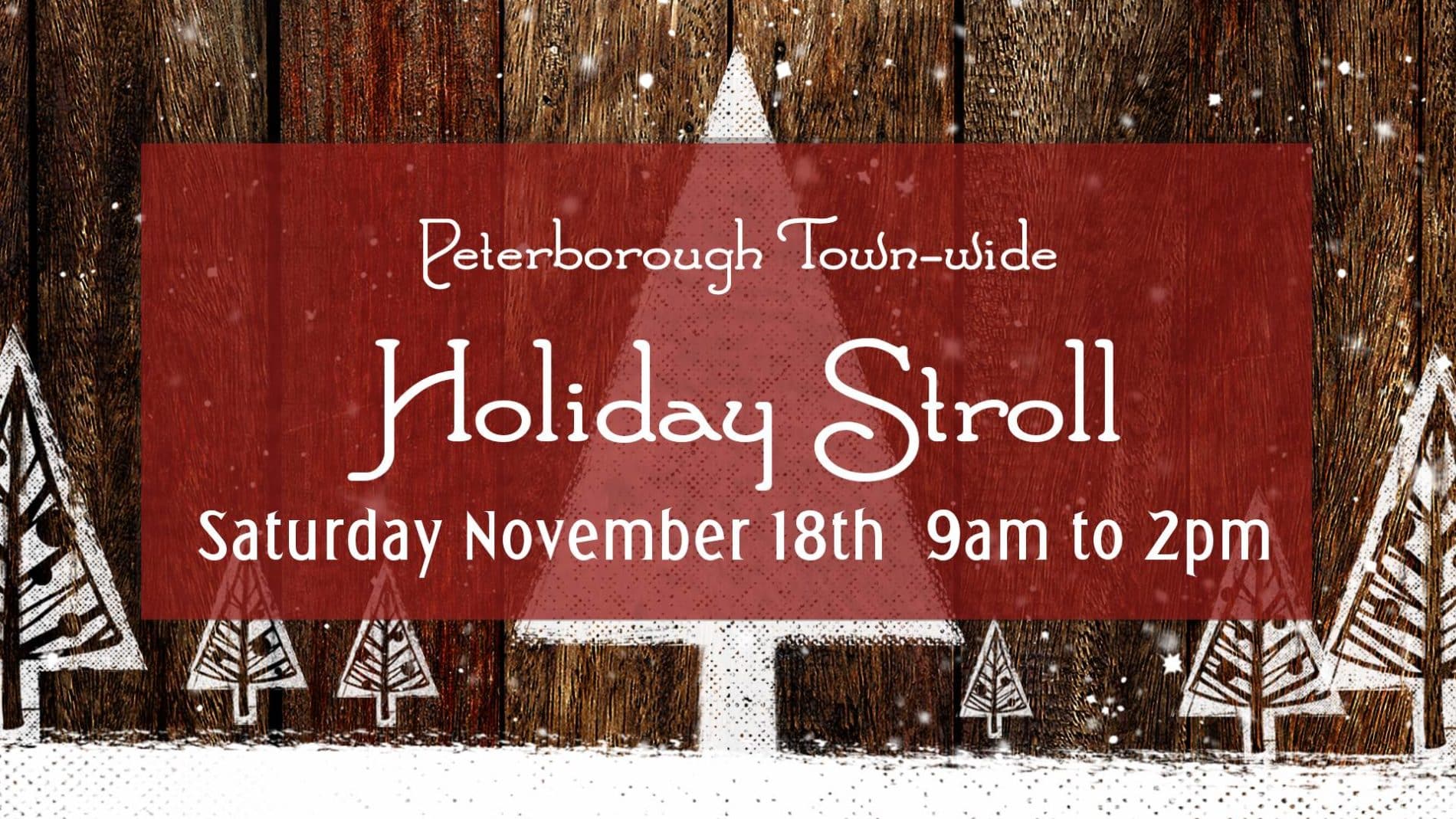 A wood sign with white trees designed on them provides a background for the Holiday Stroll hours and date