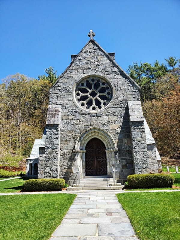 Gray stone church with circular window