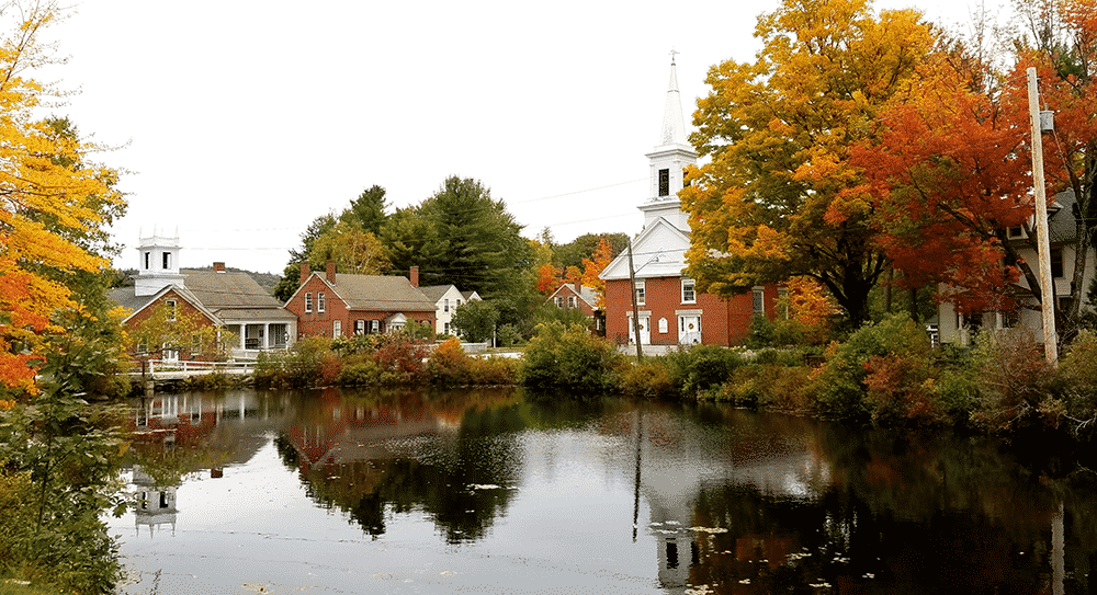 Church and buildings against a river